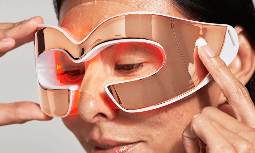 Woman wearing DermInfusions Lift Repair Eye Mask and Eyecare Max Pro by Dr Dennis Gross Skincare together